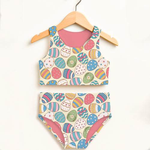 Girls colorful easter egg print two piece swimsuit with cream base pink lining and upf 50 plus high waisted comfort