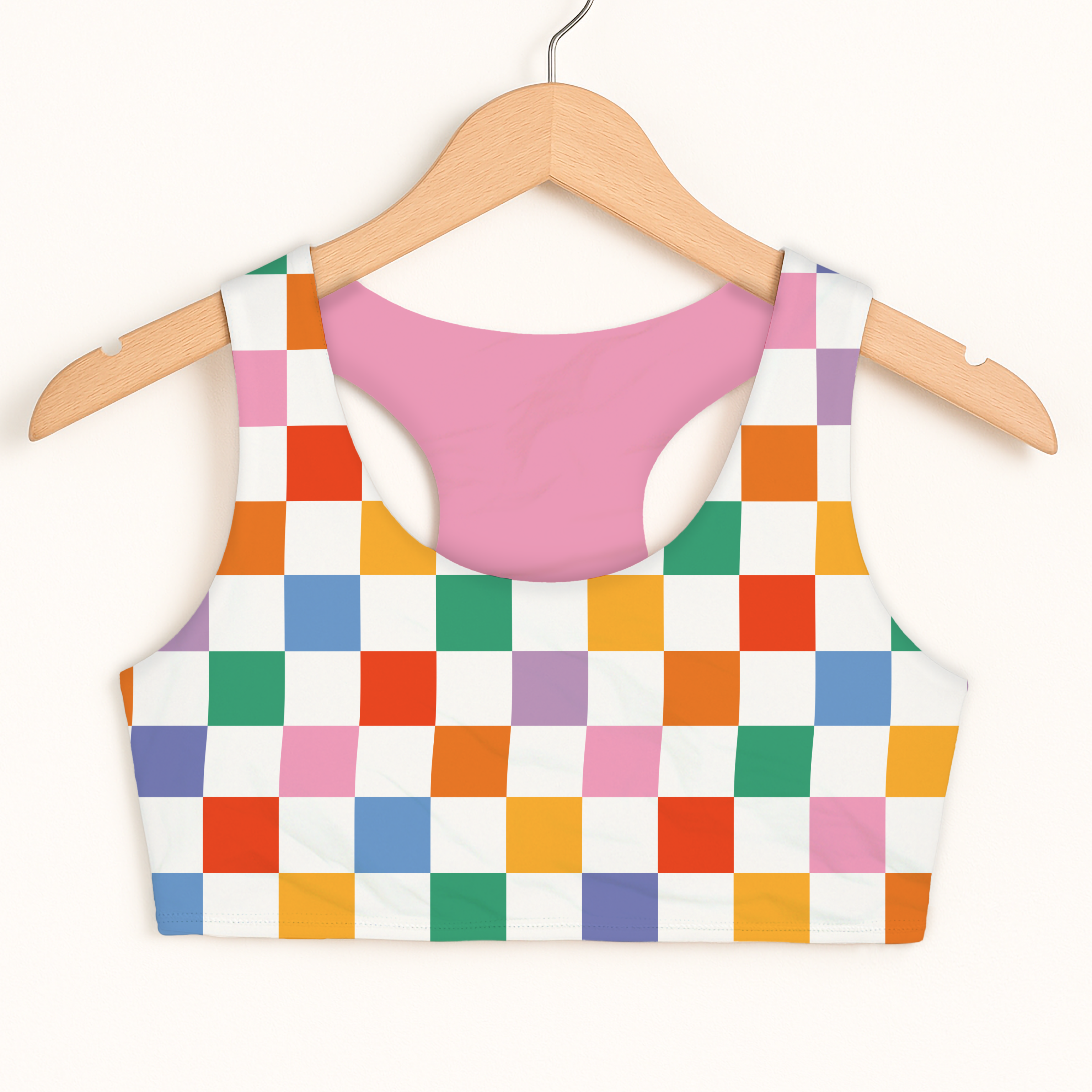 Girls colorful checkered sports bra with vibrant rainbow crop top design and soft pink double layered quick drying lining