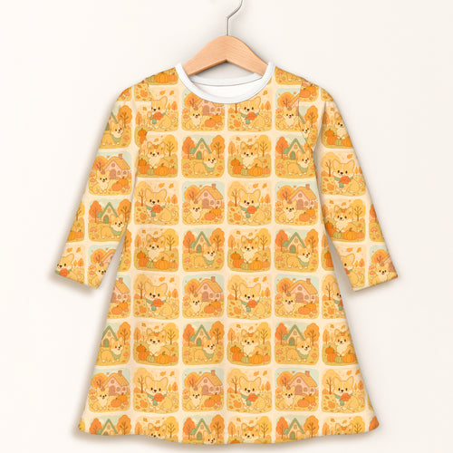 Girls fall corgi long sleeve dress in cream fabric with a-line silhouette and autumn corgi pumpkin pattern