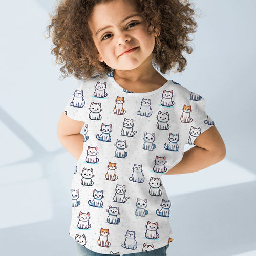 White girls short-sleeved t-shirt featuring a playful cartoon cat pattern in white orange and gray colors