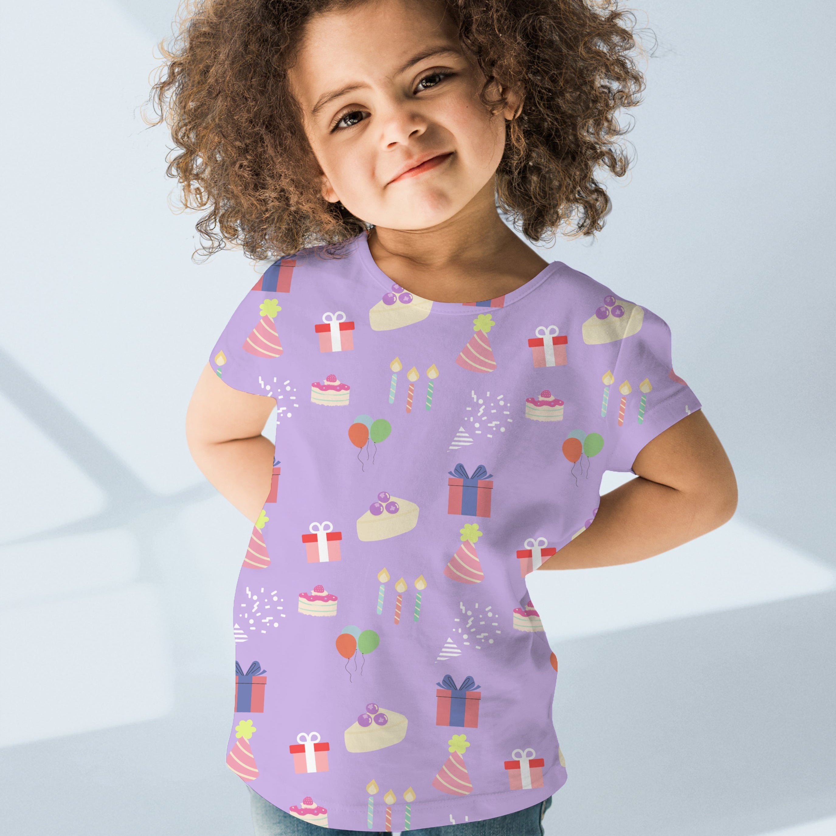 Lavender girls birthday pattern t-shirt featuring playful pastel cakes presents candles and party hats illustrations