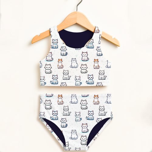 Girls cat pattern two piece swimsuit with white cat print navy blue lining double layered upf 50 plus high waisted comfort