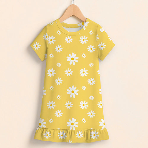 Yellow girls daisy flower dress with white daisy pattern and ruffled hem hanging on wooden hanger
