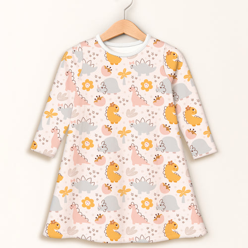 Girls floral dinosaur long sleeve dress in soft pale pink with cartoon dinosaur and flower print in yellow gray and blush
