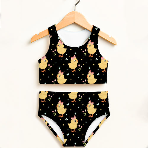 Girls black two-piece swimsuit with yellow cartoon chicks pink bows flowers and sparkles double layered upf 50+ high waisted