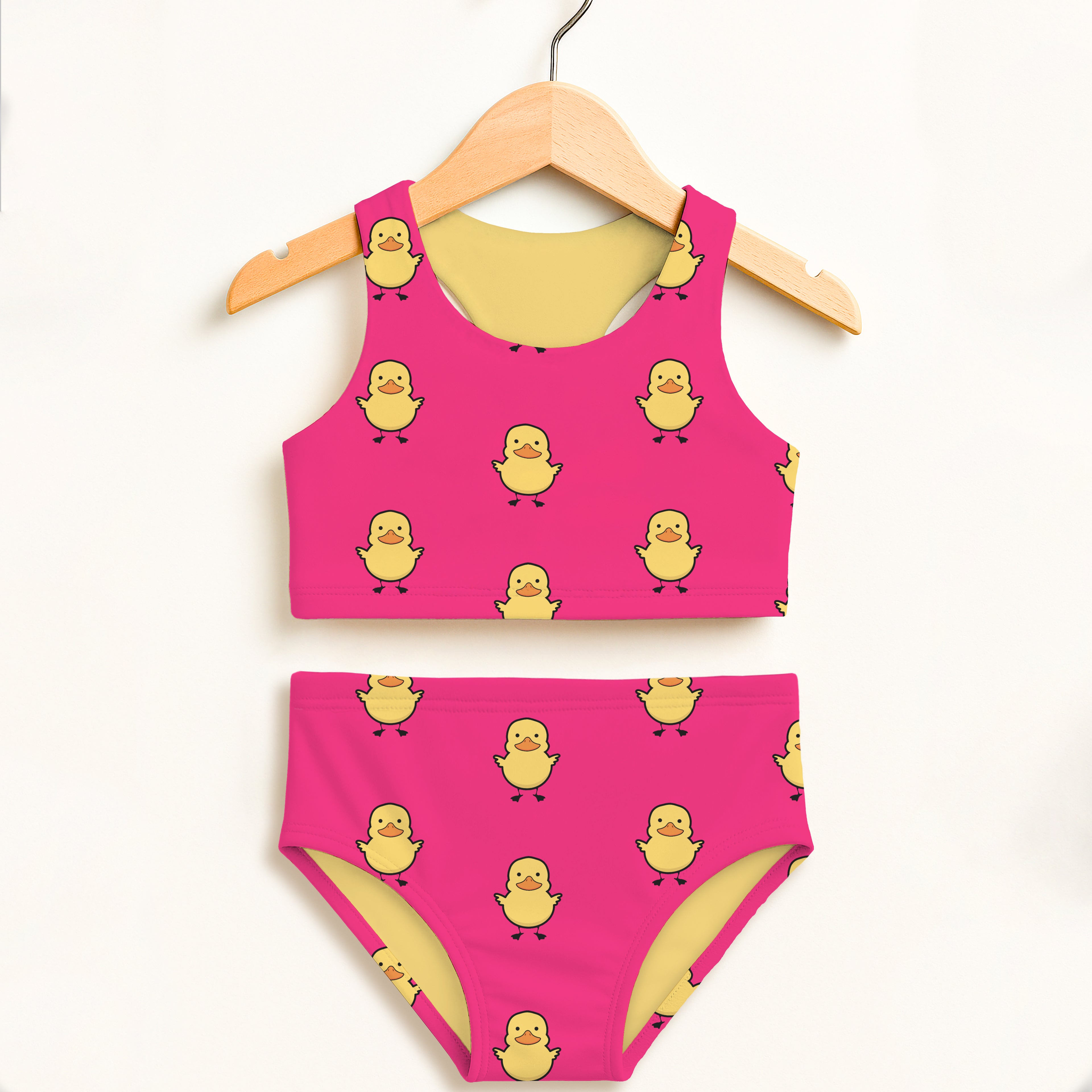 Girls pink two piece swimsuit with yellow rubber duck pattern double layered upf 50 plus high waisted comfort