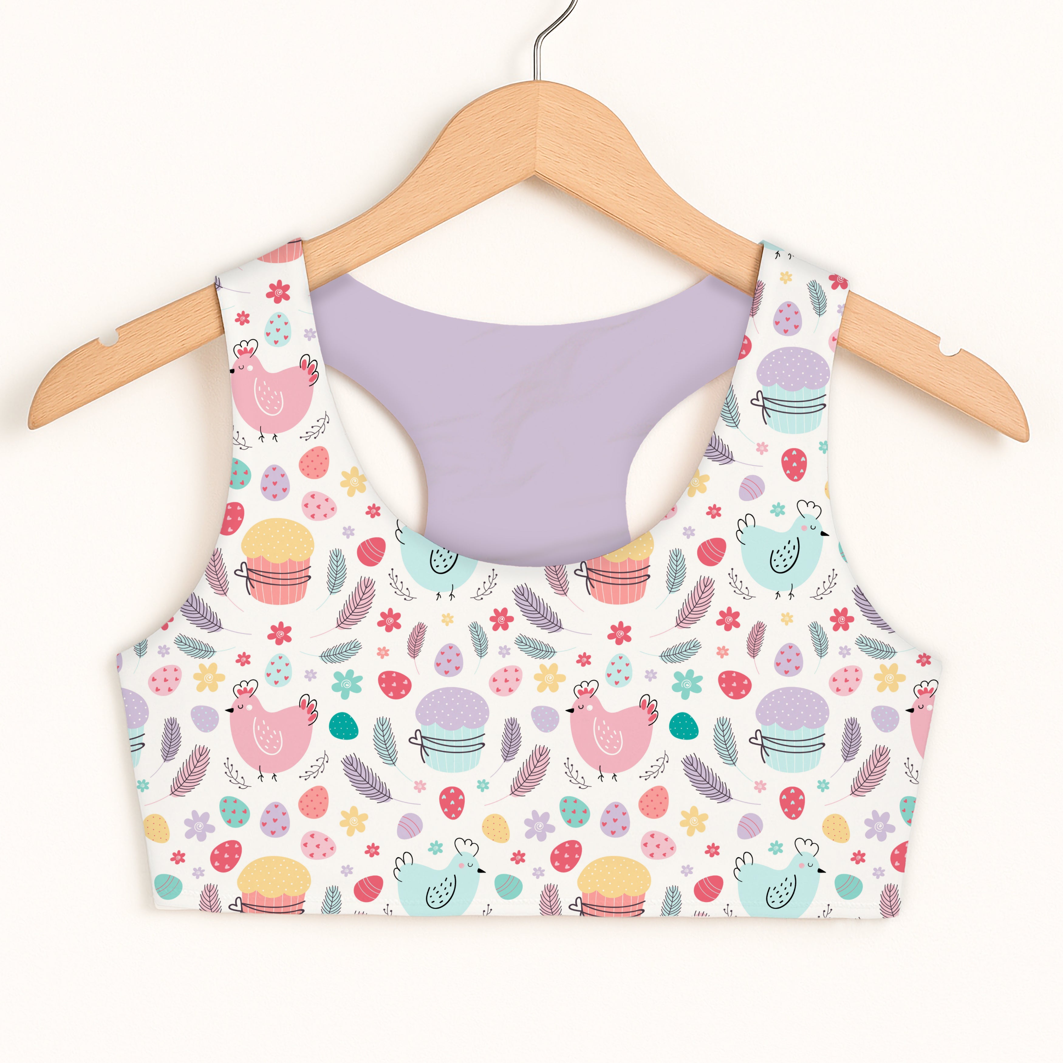 Girls Easter chick sports bra in pastel colors with pink and teal chicken and cupcake pattern quick drying comfort