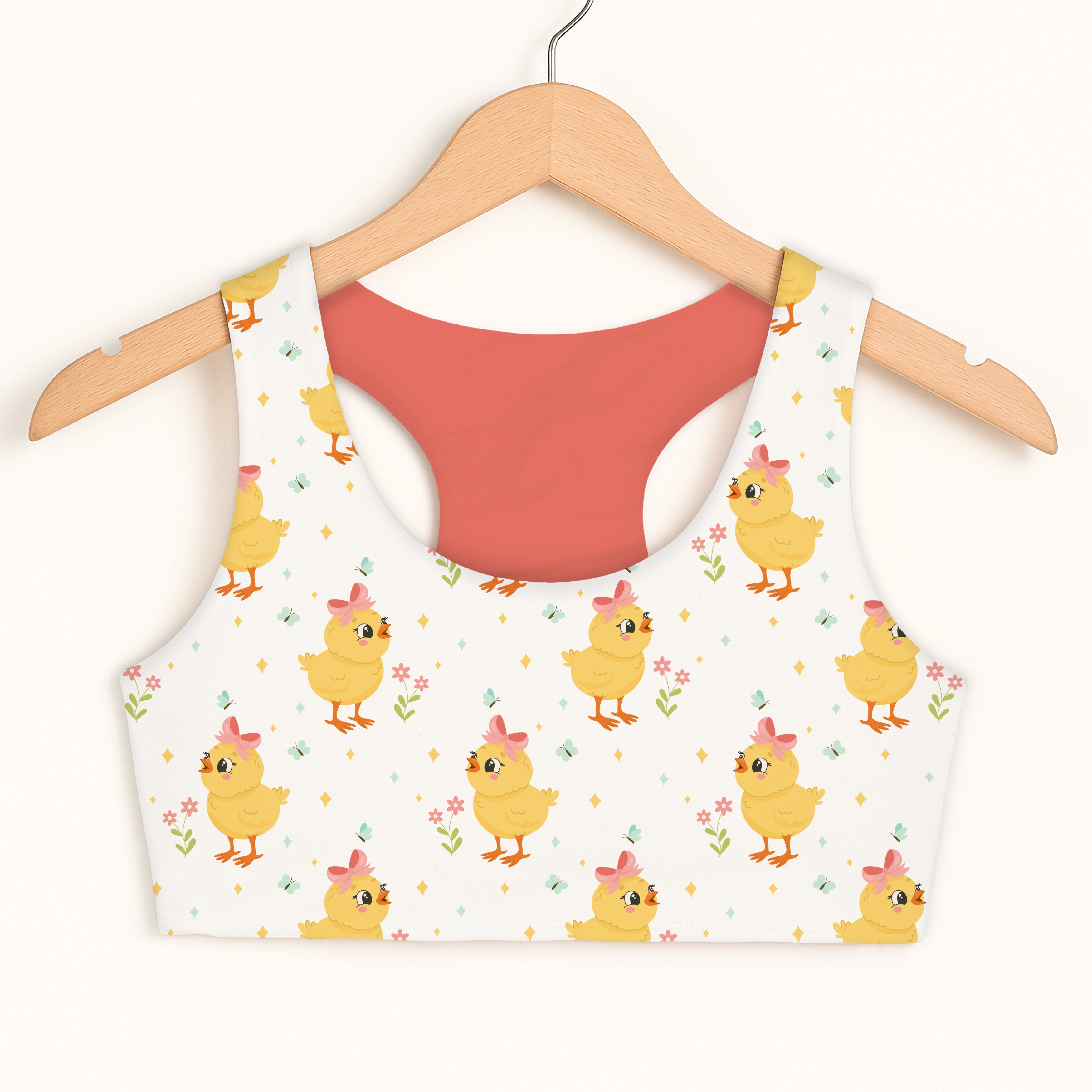 Girls yellow chick sports bra in white with double layered quick drying fabric and playful yellow chicks pattern