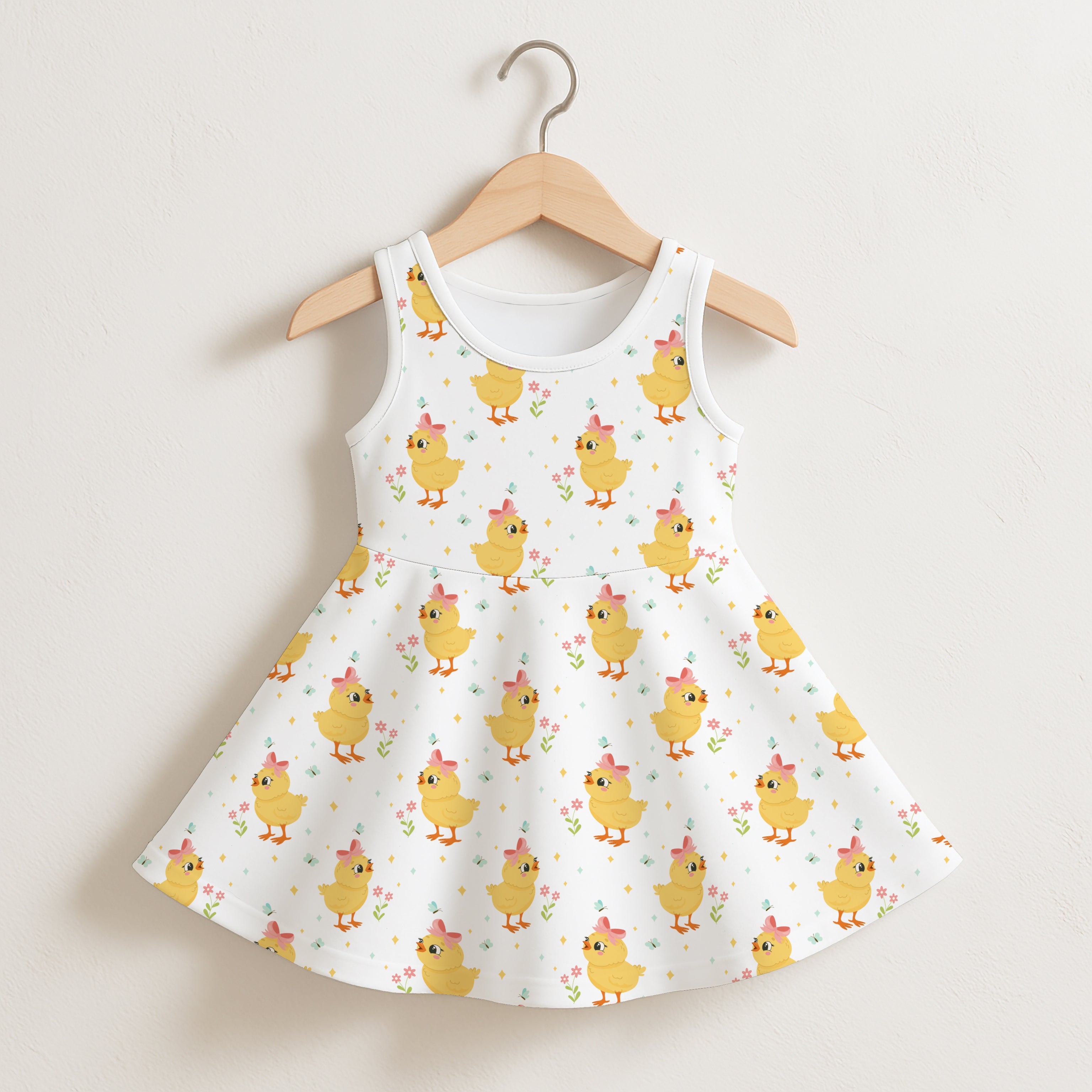 White sleeveless toddler dress with playful yellow chicks pink bows and small flowers for girls floral easter wear