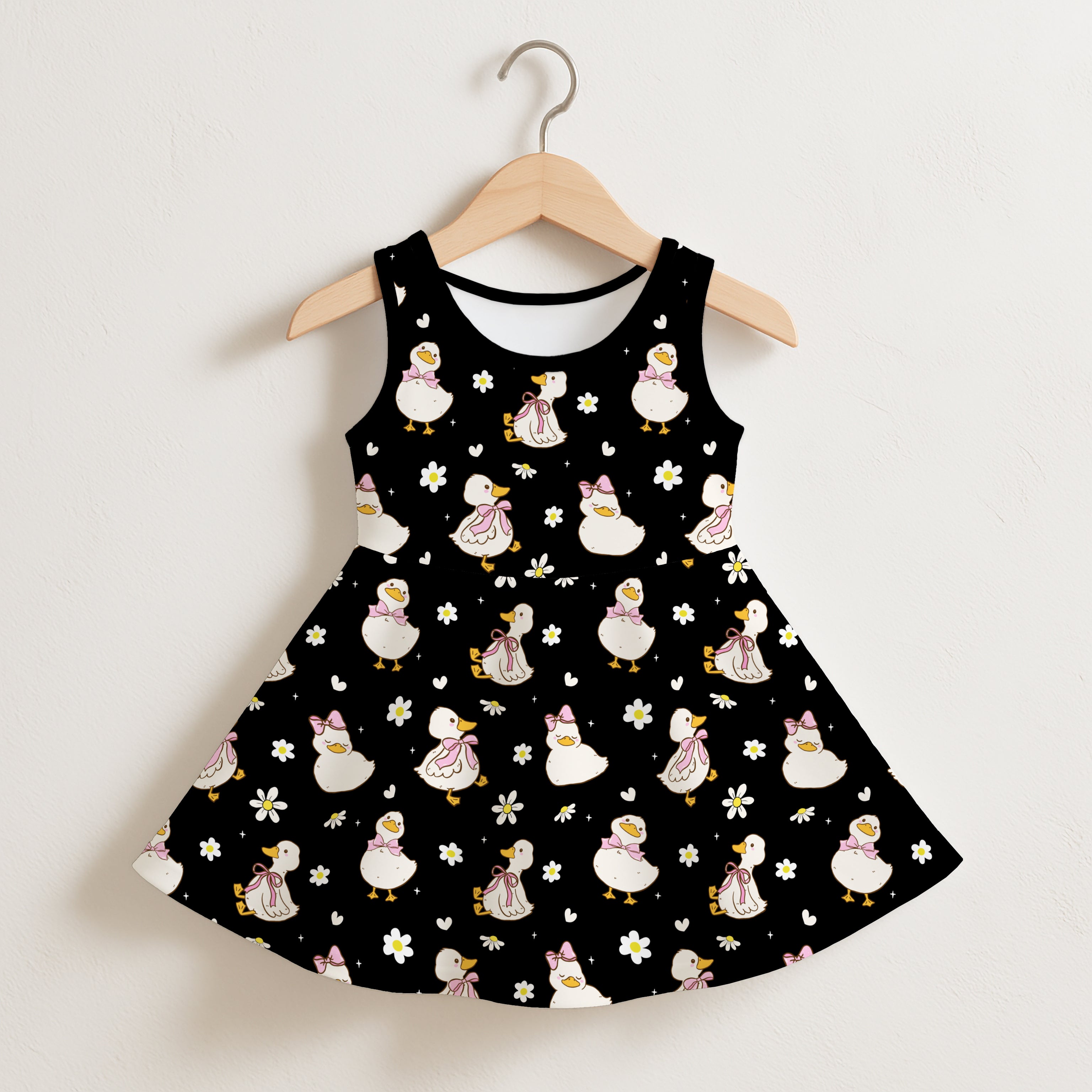 Girls cute duck sleeveless dress in black with white ducks pink bows small flowers and hearts pattern