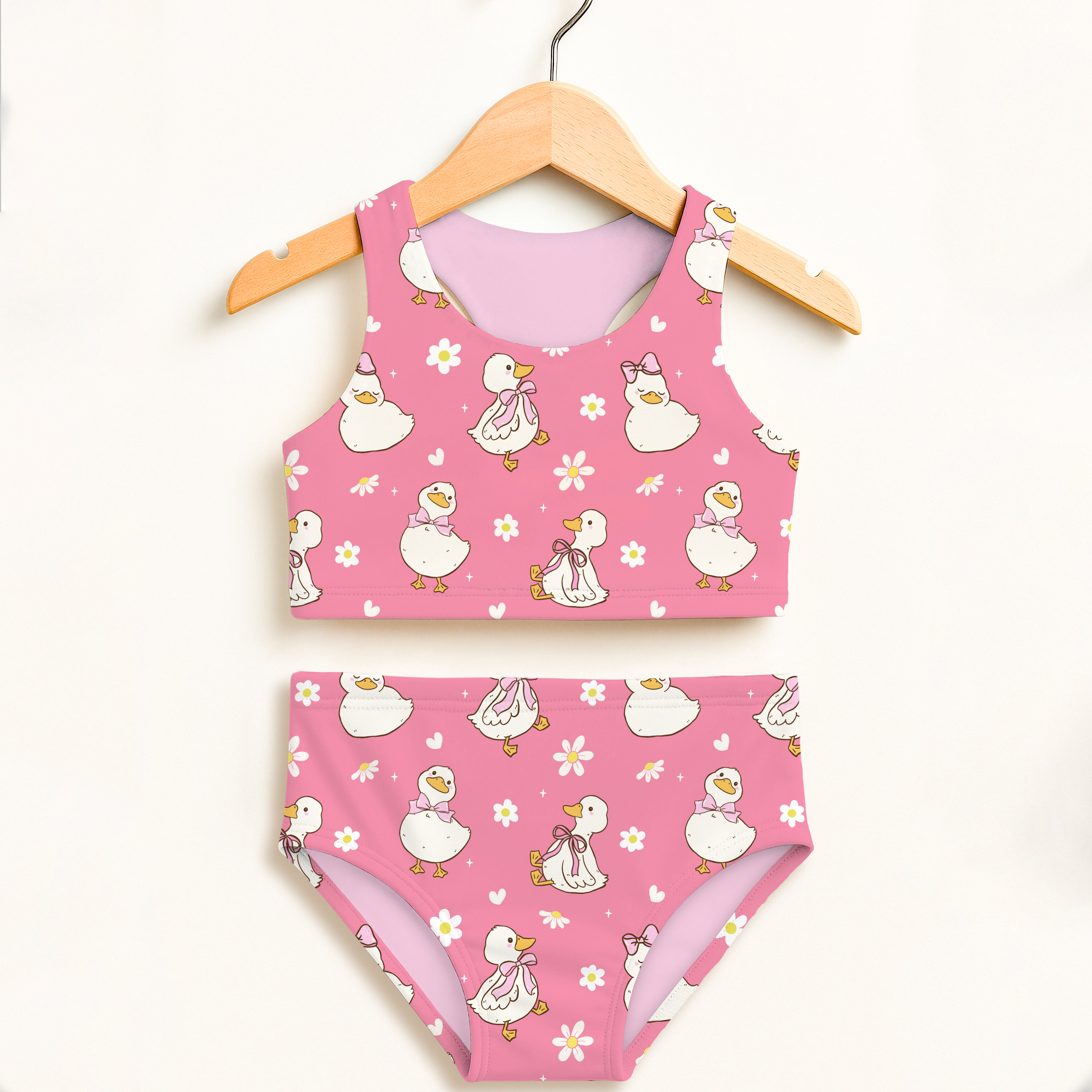 Girls pink duck two piece swimsuit with playful white cartoon ducks pink bows double layered upf 50+ high waisted comfort