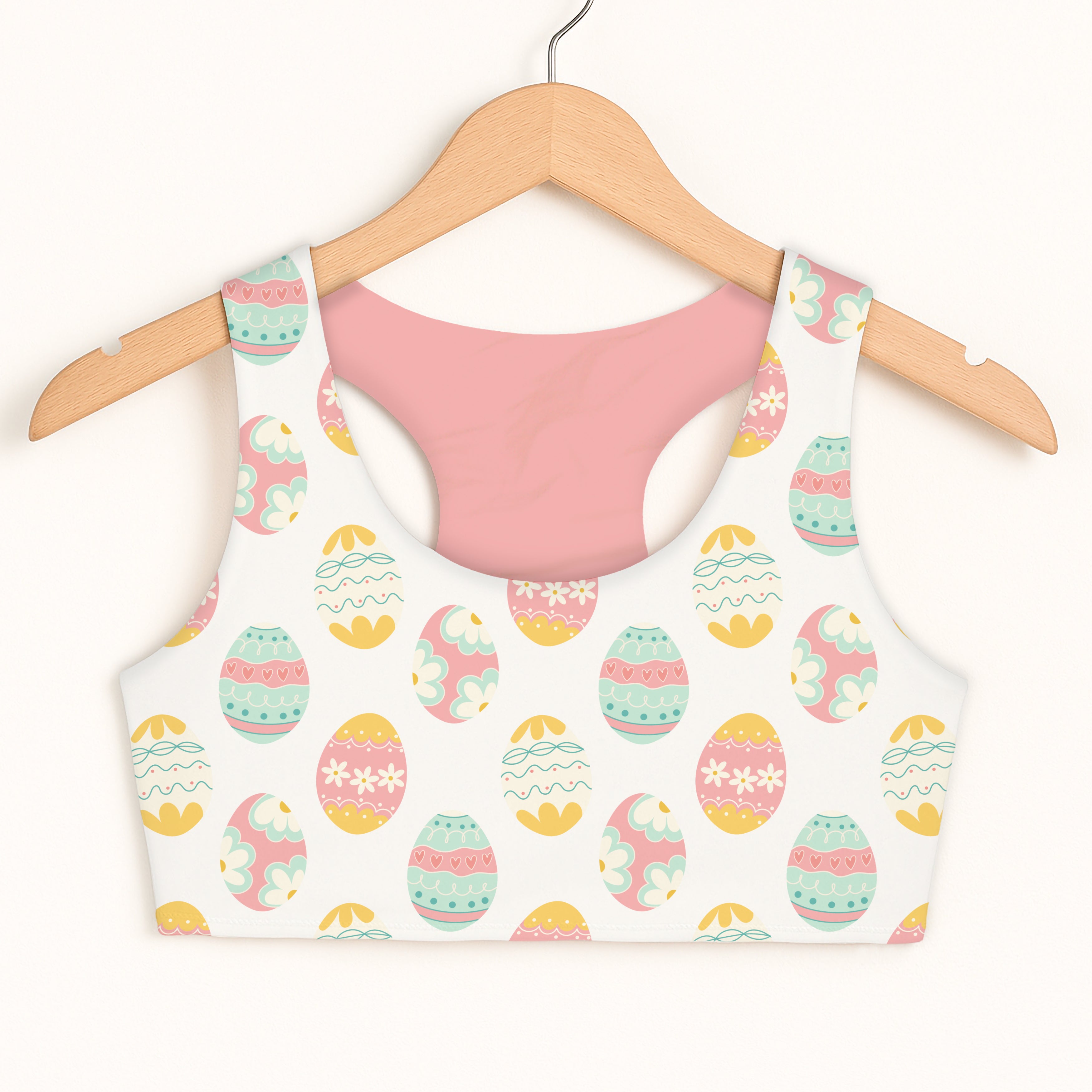 Girls easter egg themed white sports bra with pastel pink mint green and yellow eggs quick drying double layered comfort