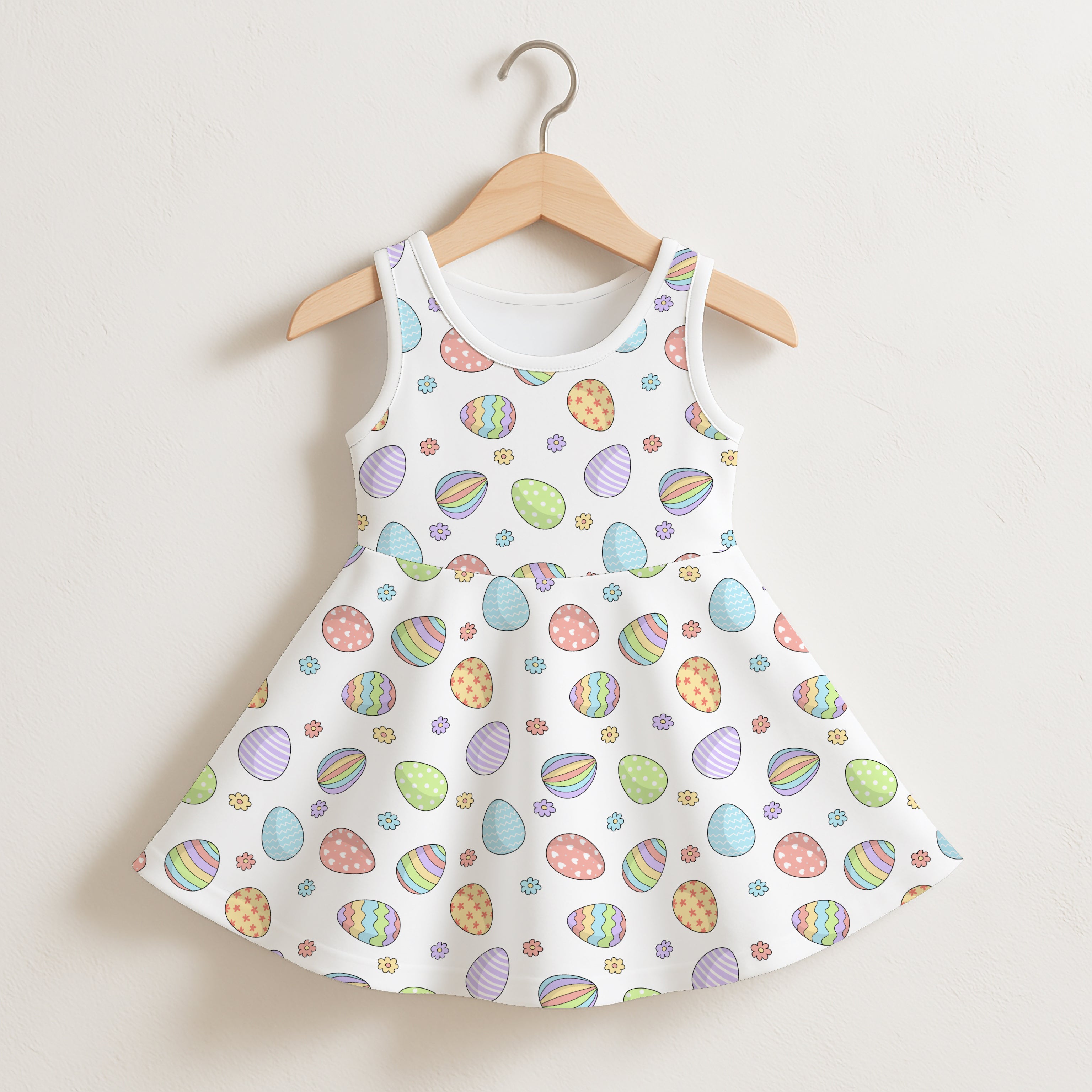 Girls rainbow easter eggs sleeveless dress white with colorful pastel egg pattern and small floral accents
