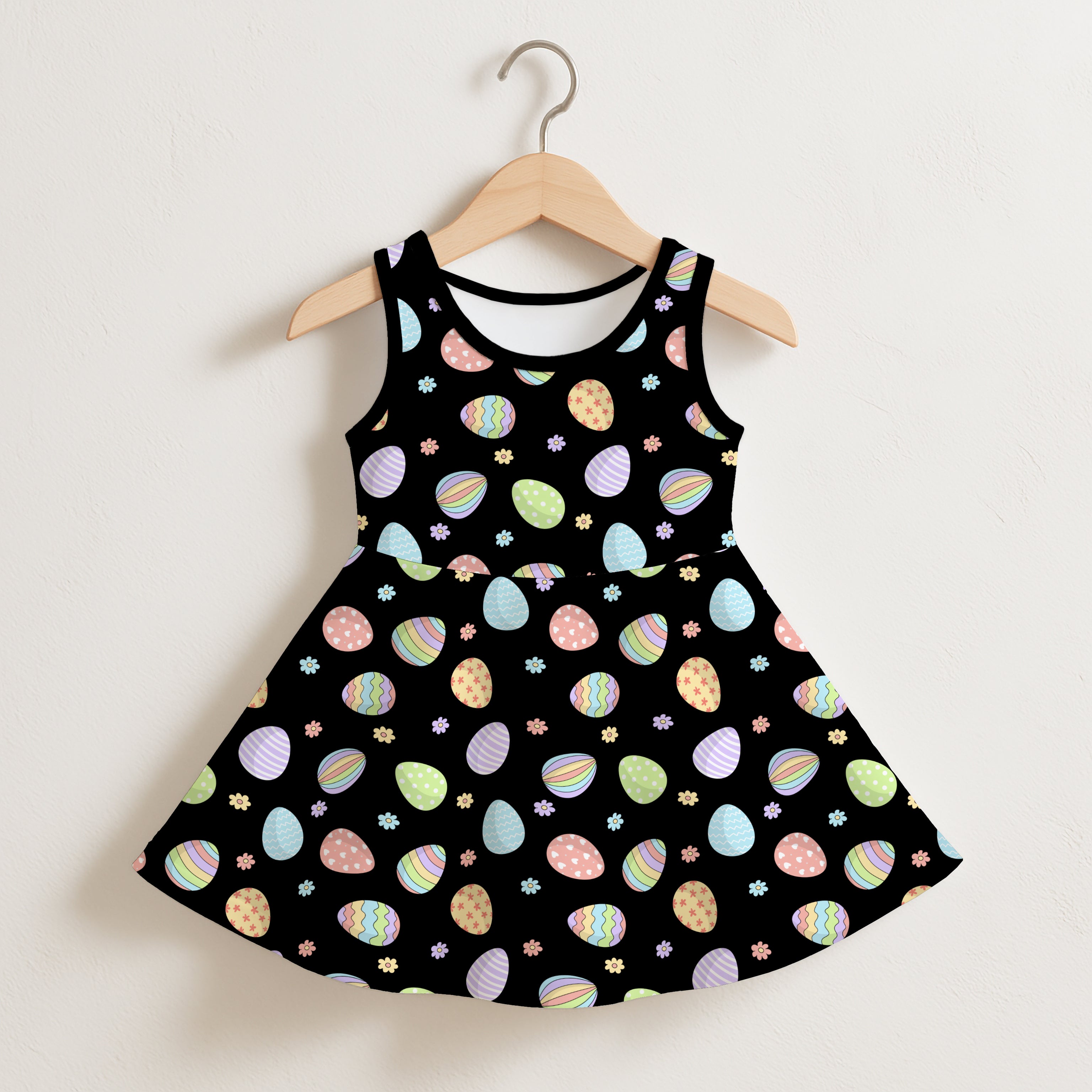 Girls rainbow Easter eggs sleeveless dress in black with colorful pastel eggs and small flowers printed fabric