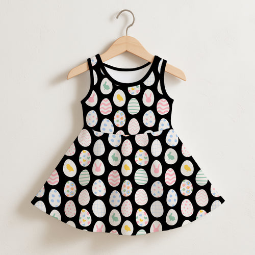 Girls easter egg sleeveless dress in black with pastel-colored easter eggs and bunnies playful pattern