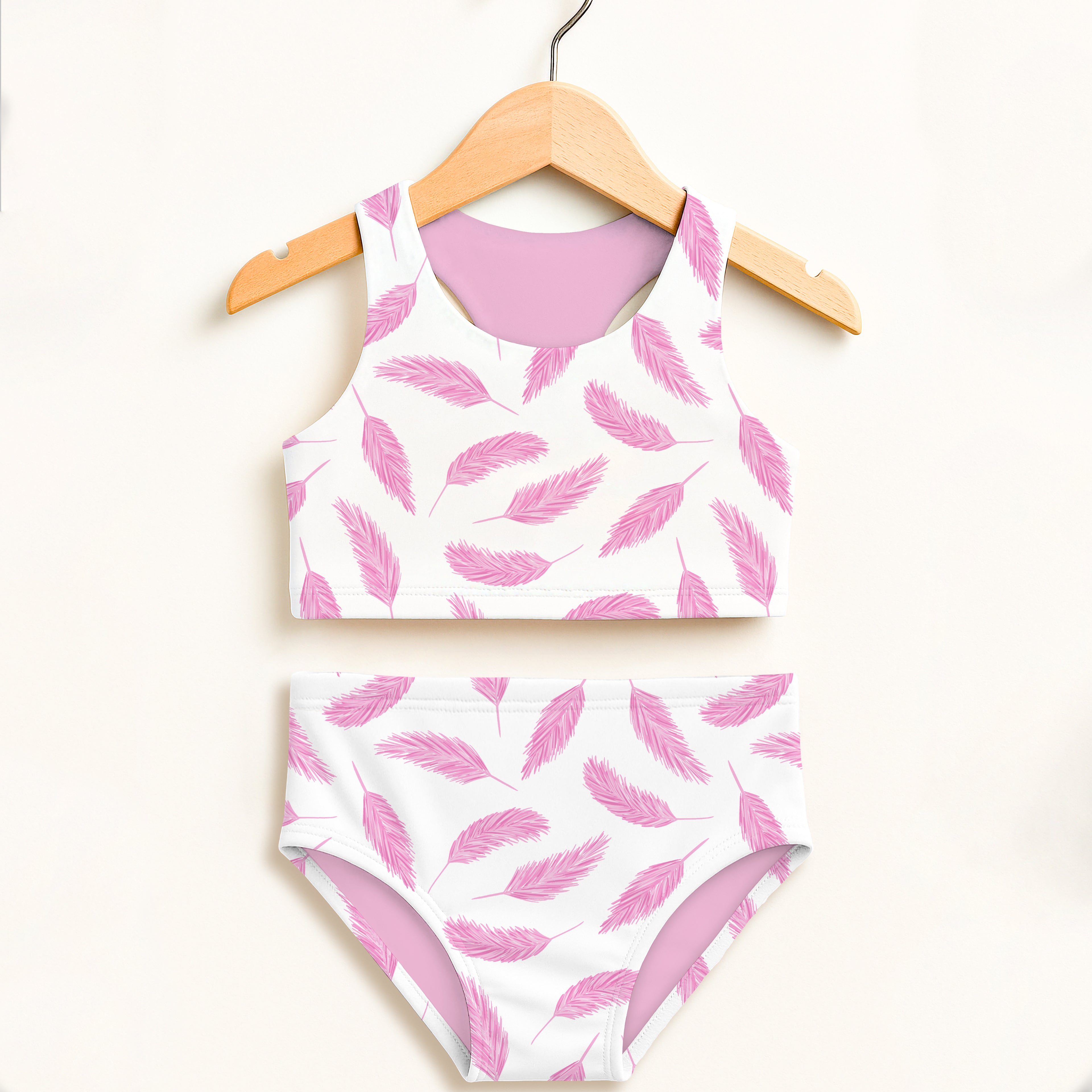 Girls pink flamingo feather two piece swimsuit with white fabric and soft lavender lining double layered UPF 50+ high waisted