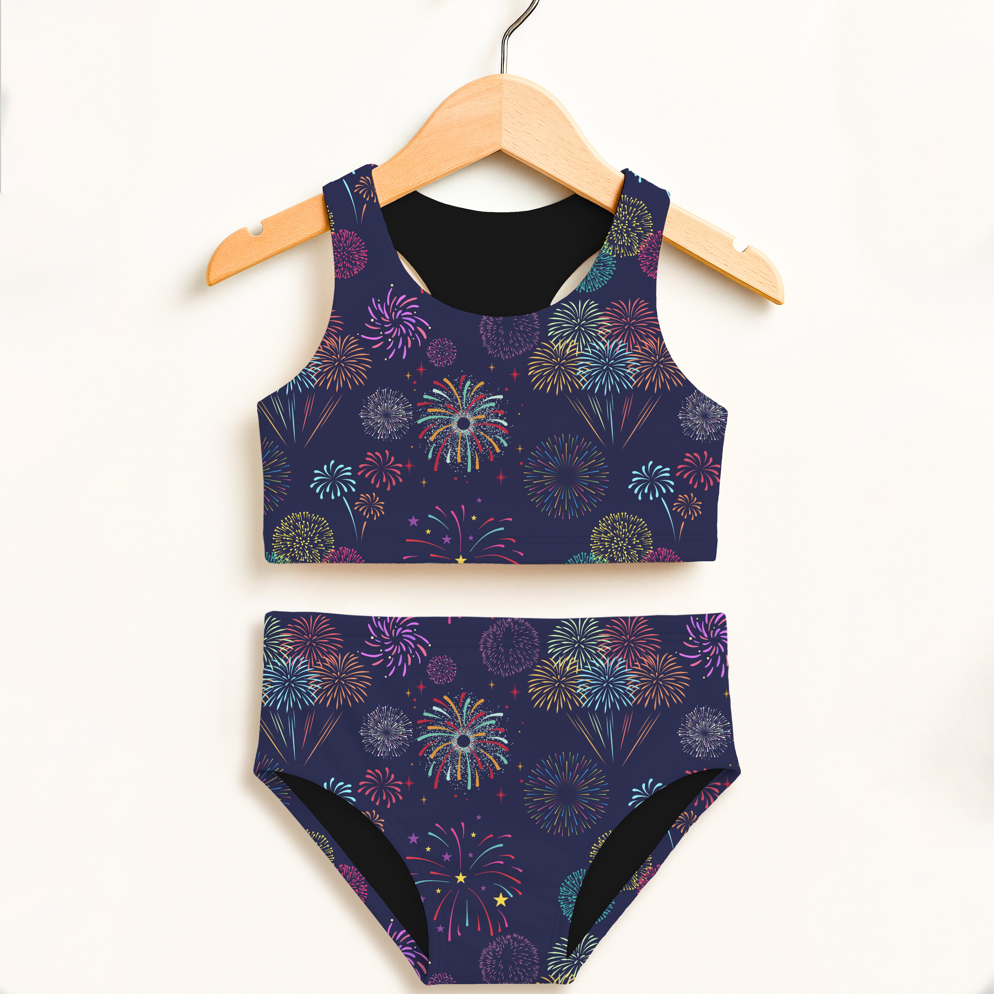 Girls colorful fireworks 4th of July navy blue two-piece swimsuit with black lining and double layered UPF 50+ fabric