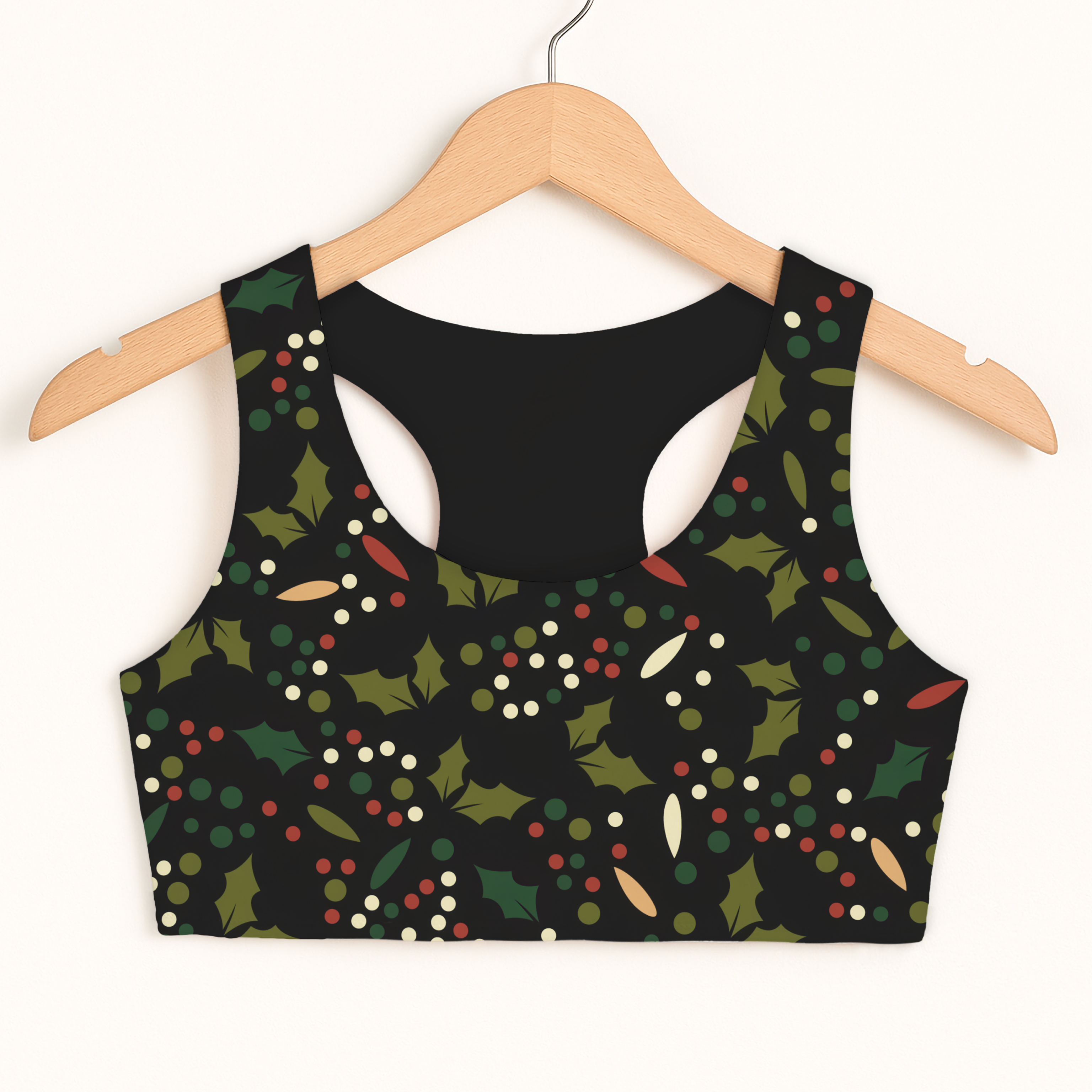 Girls holly berry christmas sports bra in black with festive holly pattern quick drying double layered comfort