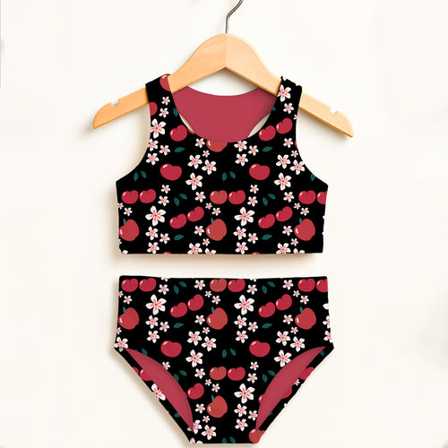 Girls black cherry blossom two piece swimsuit with pink flower pattern and magenta lining upf 50 plus high waisted comfort