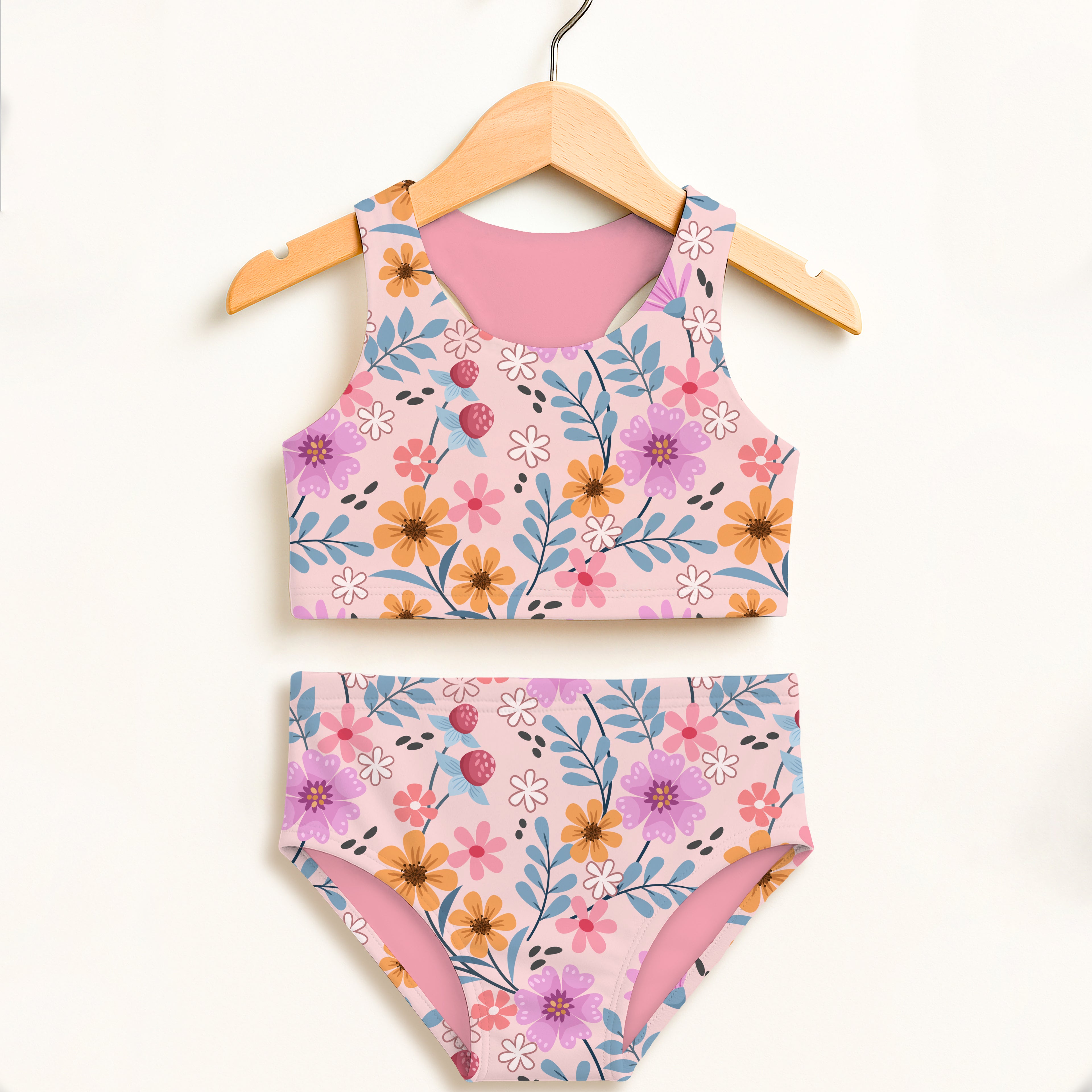 Girls pink wildflower two piece swimsuit with purple orange blue flowers strawberry accents and UPF 50+ protection