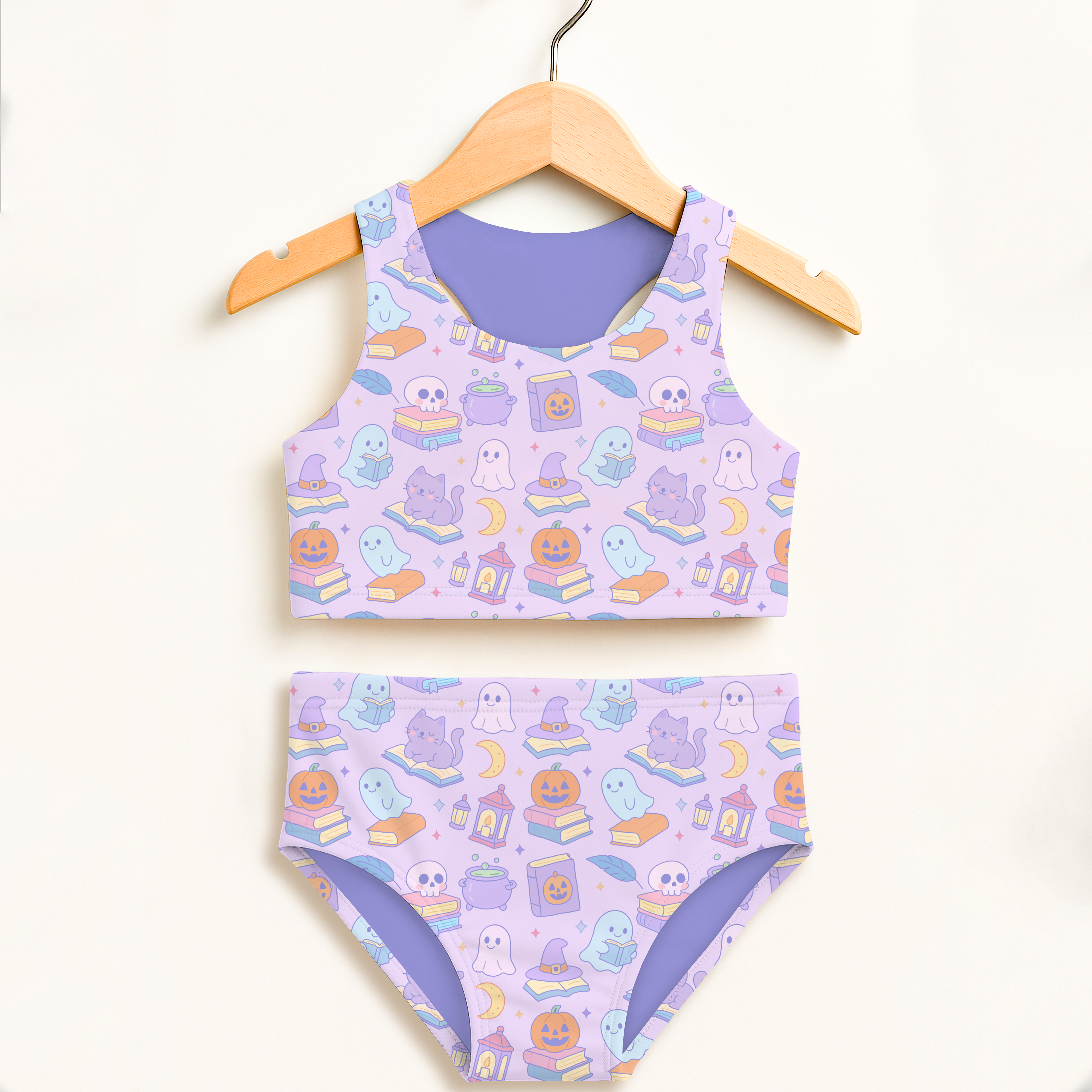 Lavender girls spooky book themed halloween two-piece swimsuit with ghost cat pumpkin witch hat prints on soft fabric