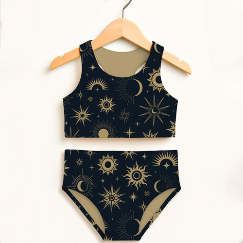 Dark blue girls celestial sun and moon two piece swimsuit set with gold celestial pattern and upf 50 plus protection