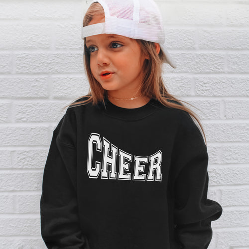 Black long-sleeved girls cheer sweatshirt with bold white block letters for practice and everyday wear