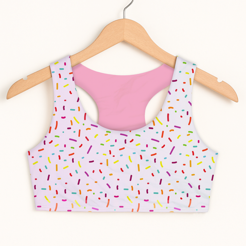 Girls colorful sprinkles sports bra in pastel pink and white with quick drying fabric and double layered comfort
