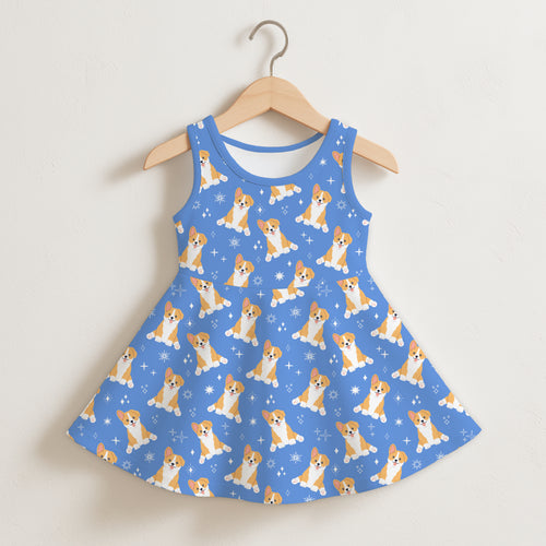 Girls blue sleeveless dress featuring a playful corgi dog and snowflake pattern perfect for casual wear