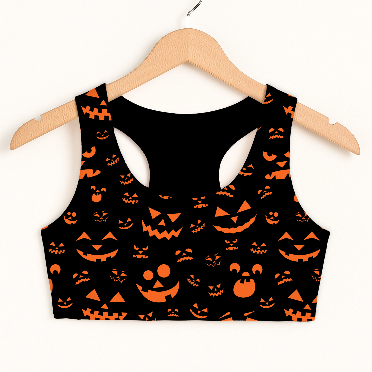 Girls Orange Jack-O'-Lantern Faces Halloween Sports Bra