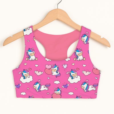 Girls unicorn hearts sports bra quick drying double layered comfort with pink fabric and playful cartoon unicorn pattern