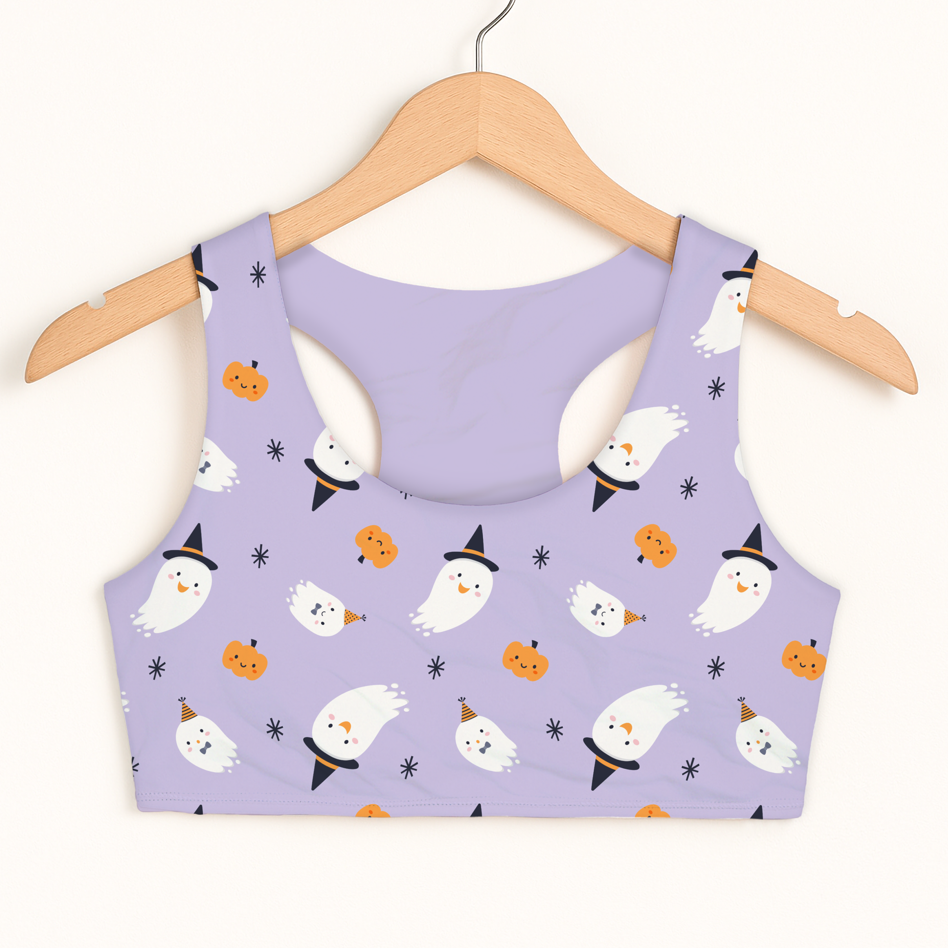 Girls ghost witch halloween sports bra in lavender with white ghosts and orange pumpkins quick drying double layered comfort