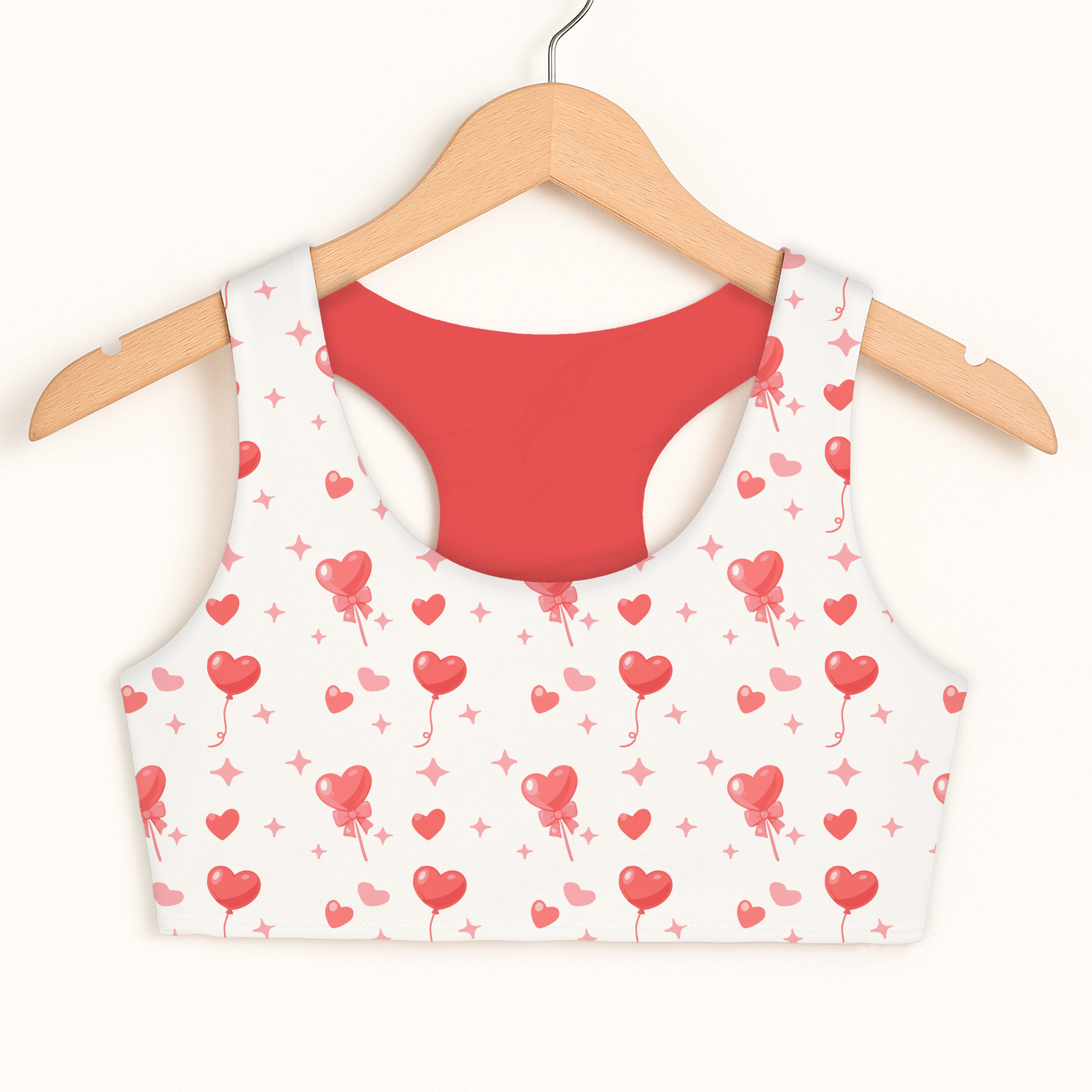 White girls sports bra with red interior and pink heart balloon pattern quick drying double layered comfort