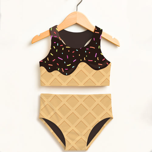 Girls chocolate ice cream waffle cone two piece swimsuit with black chocolate sprinkle top and tan waffle-patterned high waisted bottom