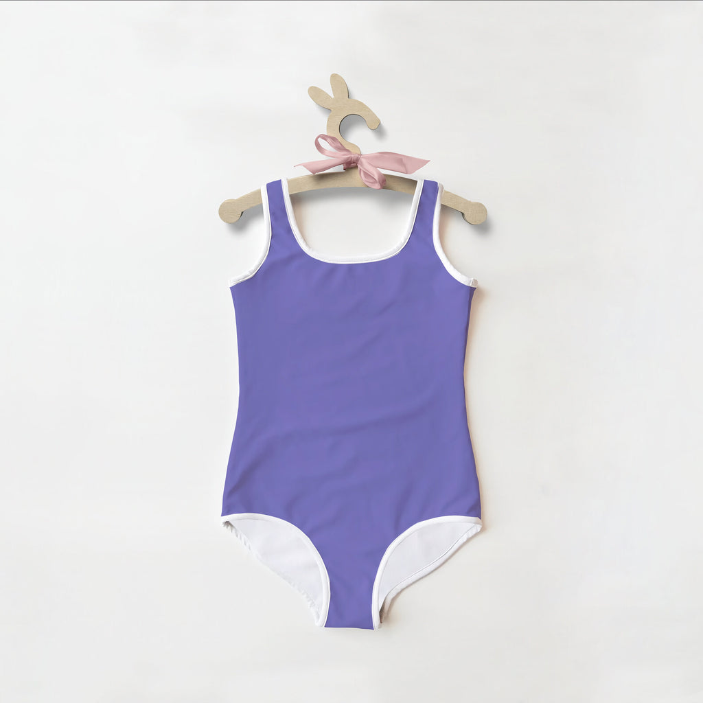 Girls buttery soft purple one-piece swimsuit with white trim and pink ribbon with upf 50 sun protection