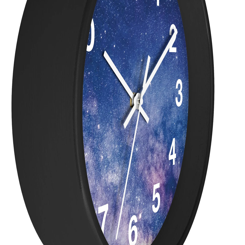 Black-framed galaxy silent wood wall clock with cosmic blue and purple design white numerals and silver hands