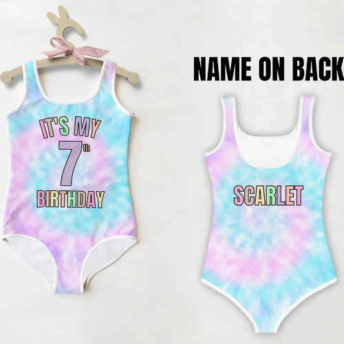 Pastel tie dye one-piece swimsuit with white trim and custom text on back for girls 7th birthday celebration