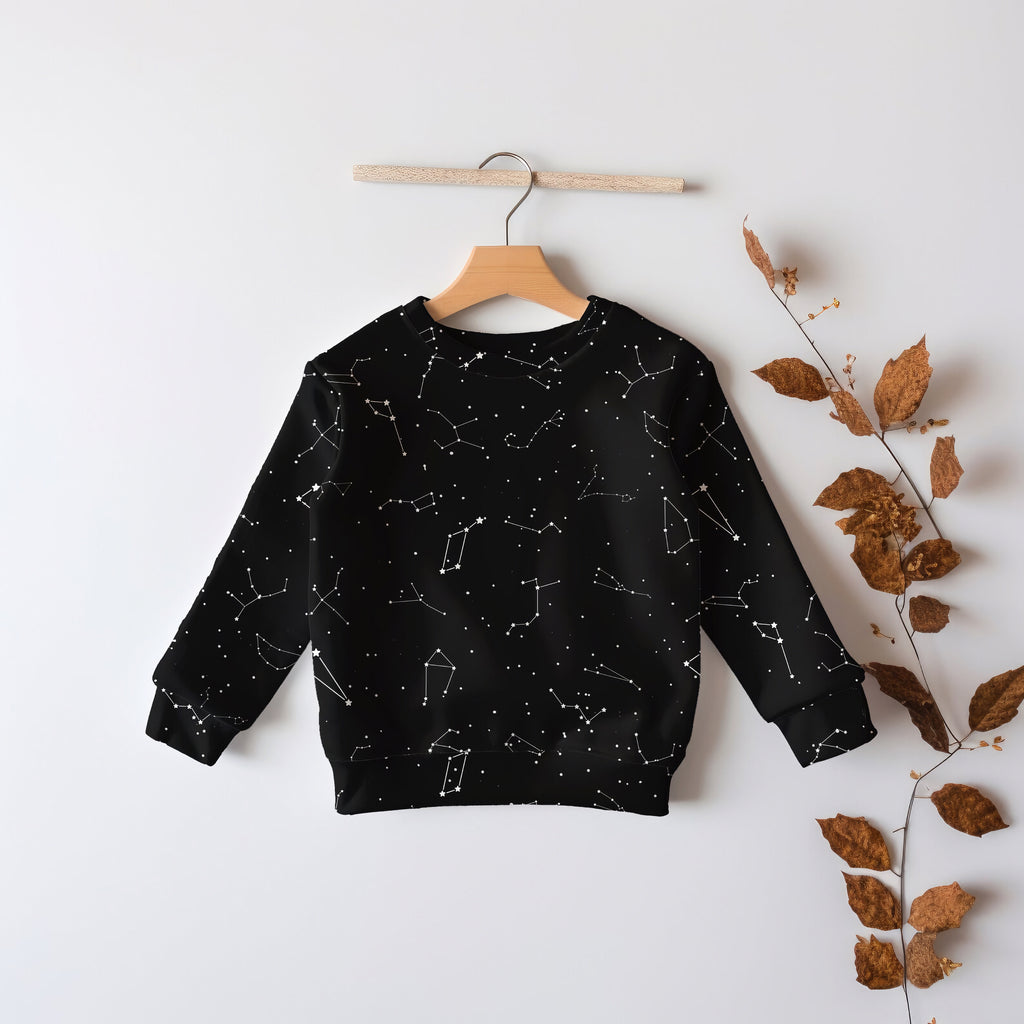 Black kids sweatshirt with white constellation pattern made of cozy cotton fleece or lightweight sports fabric