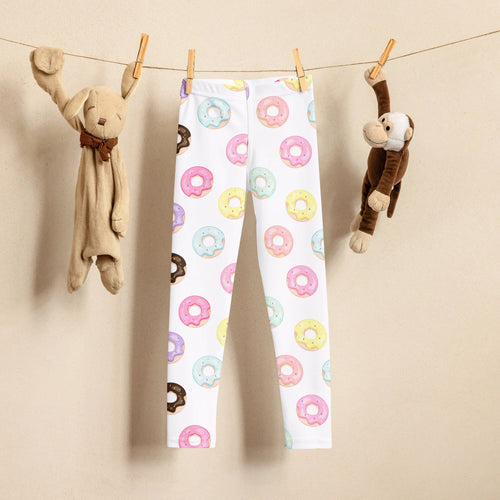 Girls colorful donuts leggings featuring white fabric with pastel-colored donut patterns and chocolate glaze accents