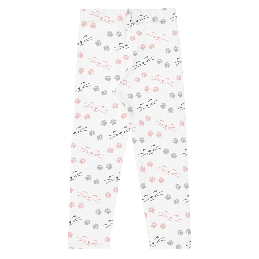 Girls paw print cat leggings are white with a playful pattern of pink and gray cat faces whiskers and paw prints