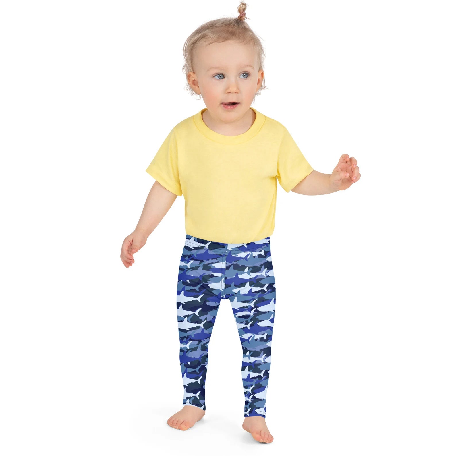 Kids blue shark buttery soft leggings featuring blue and white shark patterns made from soft fabric for comfort