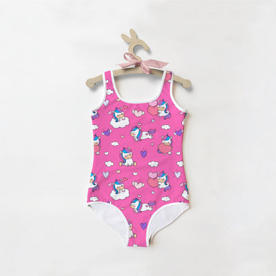 Pink girls unicorn hearts buttery soft one-piece swimsuit with white trim and playful cartoon unicorn pattern