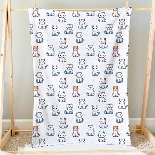 Girls cat pattern blanket soft white with colorful cartoon cats in playful poses perfect for cozy use
