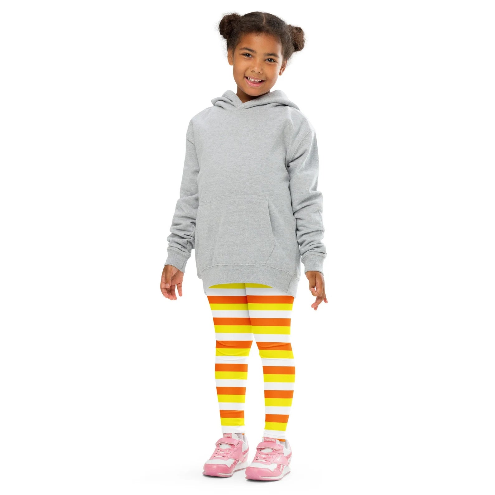 Gray hooded sweatshirt with front pocket and long sleeves paired with kids striped halloween candy corn buttery soft leggings