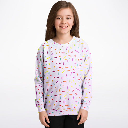 A soft lavender girls sweatshirt with colorful sprinkles made from cozy cotton fleece or lightweight sports fabric