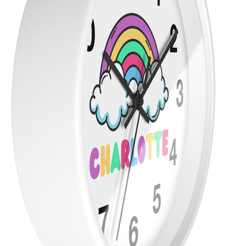White round silent wood wall clock for girls with a colorful rainbow cloud design and multicolored name charlotte