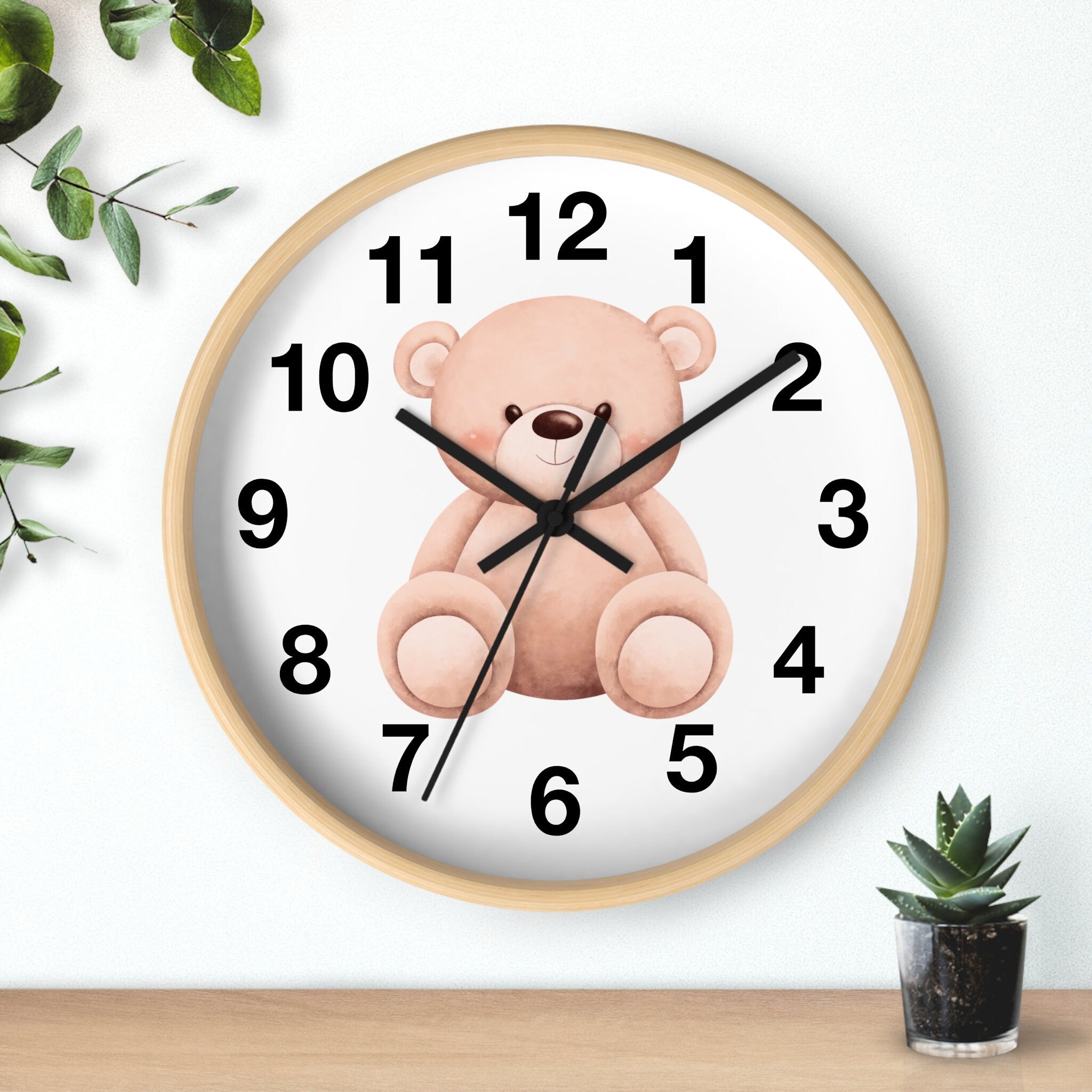 Kids teddy bear silent wood wall clock with light wood frame white face and pink teddy bear illustration