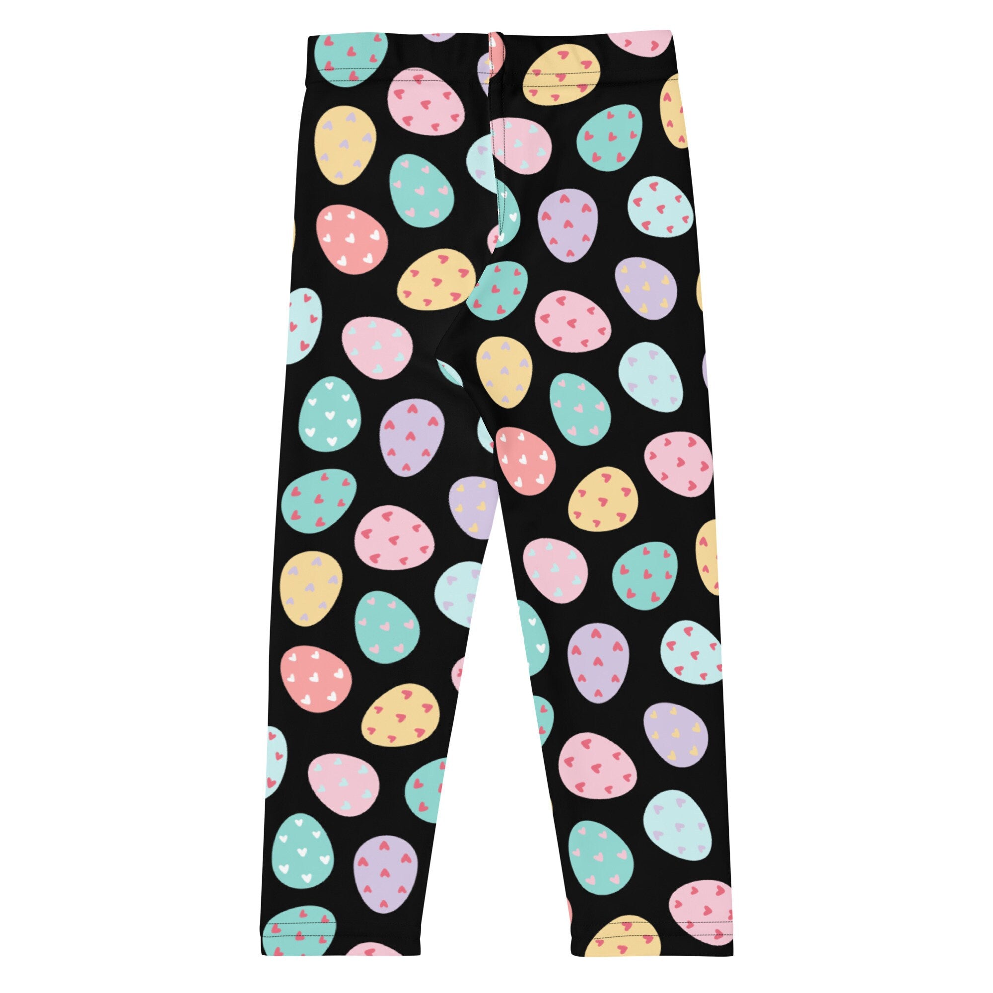 Kids colorful easter egg buttery soft black leggings with pastel pink yellow teal lavender eggs and heart details