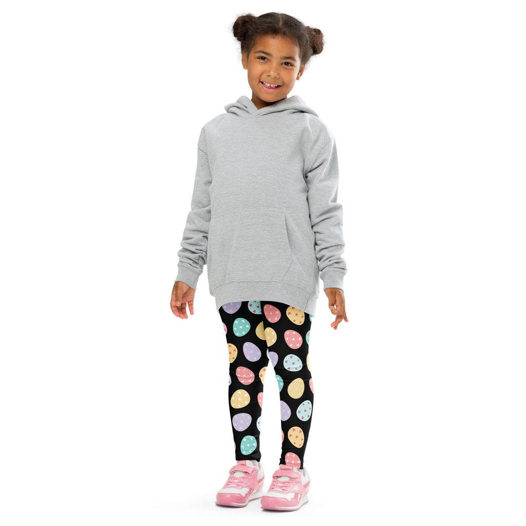 Gray hooded sweatshirt with long sleeves and front pocket paired with kids colorful easter egg buttery soft leggings