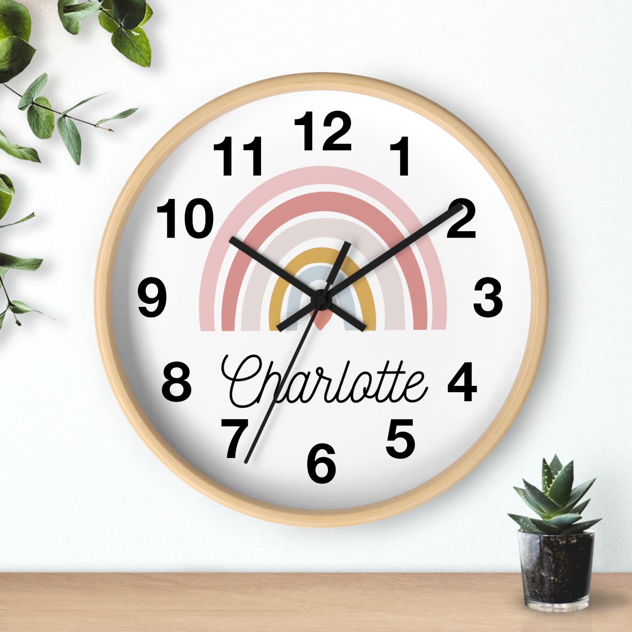 Girls custom name rainbow heart silent wood wall clock with light wood frame black numerals and pastel rainbow face